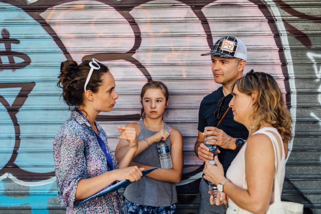 Get to know the Parisian neighborhood of Le Marais on a food walking tour with a guide who introduces you to local food vendors and artisans.
Tour guide explains the tour to tourists, Paris, on July 23th, 2019.