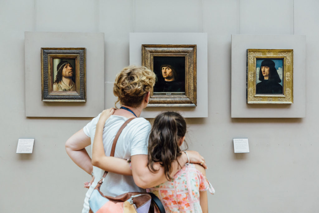 Experience culture and art through the ages with a small-group tour of Paris’ epic Louvre Museum.
Two tourists looking at paintings, Louvre, Paris, on July 24th, 2019