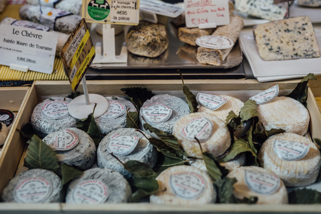 Get to know the Parisian neighborhood of Le Marais on a food walking tour with a guide who introduces you to local food vendors and artisans.
French cheese stand in the Marché des enfants rouges, Paris, on July 23th, 2019.
