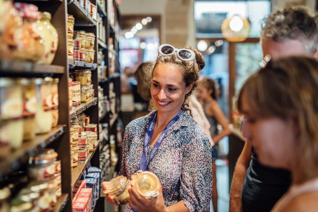 Get to know the Parisian neighborhood of Le Marais on a food walking tour with a guide who introduces you to local food vendors and artisans.
Tour guide is presenting products from J.C. Barthouil shop, Paris, on July 23th, 2019.