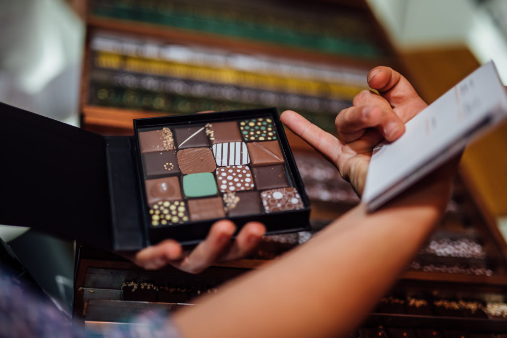 Get to know the Parisian neighborhood of Le Marais on a food walking tour with a guide who introduces you to local food vendors and artisans.
Chocolate pieces from Edwart shop, chocolatier, Paris, on July 23th, 2019.