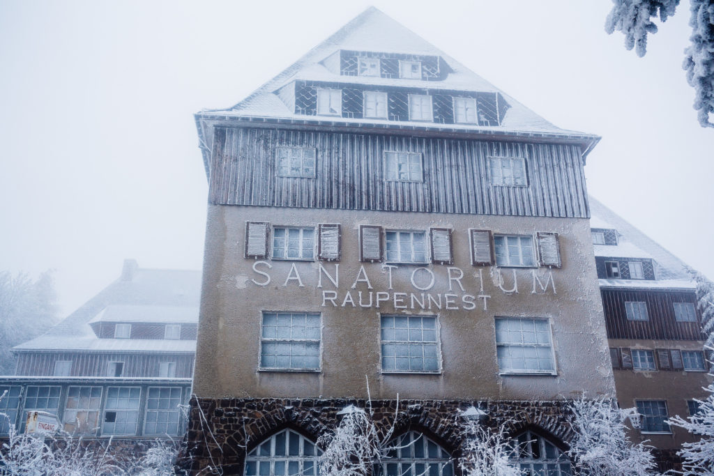 Main wall in winter of the Former Sanatorium Raupennest in Altenberg, Germany. The building was built in 1926, at first it was an Hotel, then during the WW2 it was used as an Hospistal. After the war, the use was a sanatorium of 150 beds. The place closed in 1997.